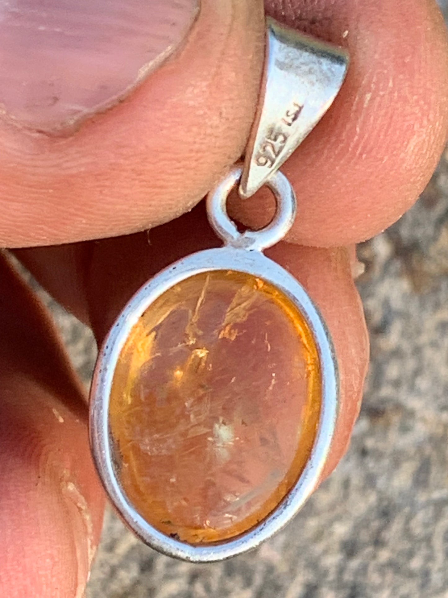 Citrine, silver medallion 30mm high x 14 x 8. Sold with adjustable cord, ready to wear!