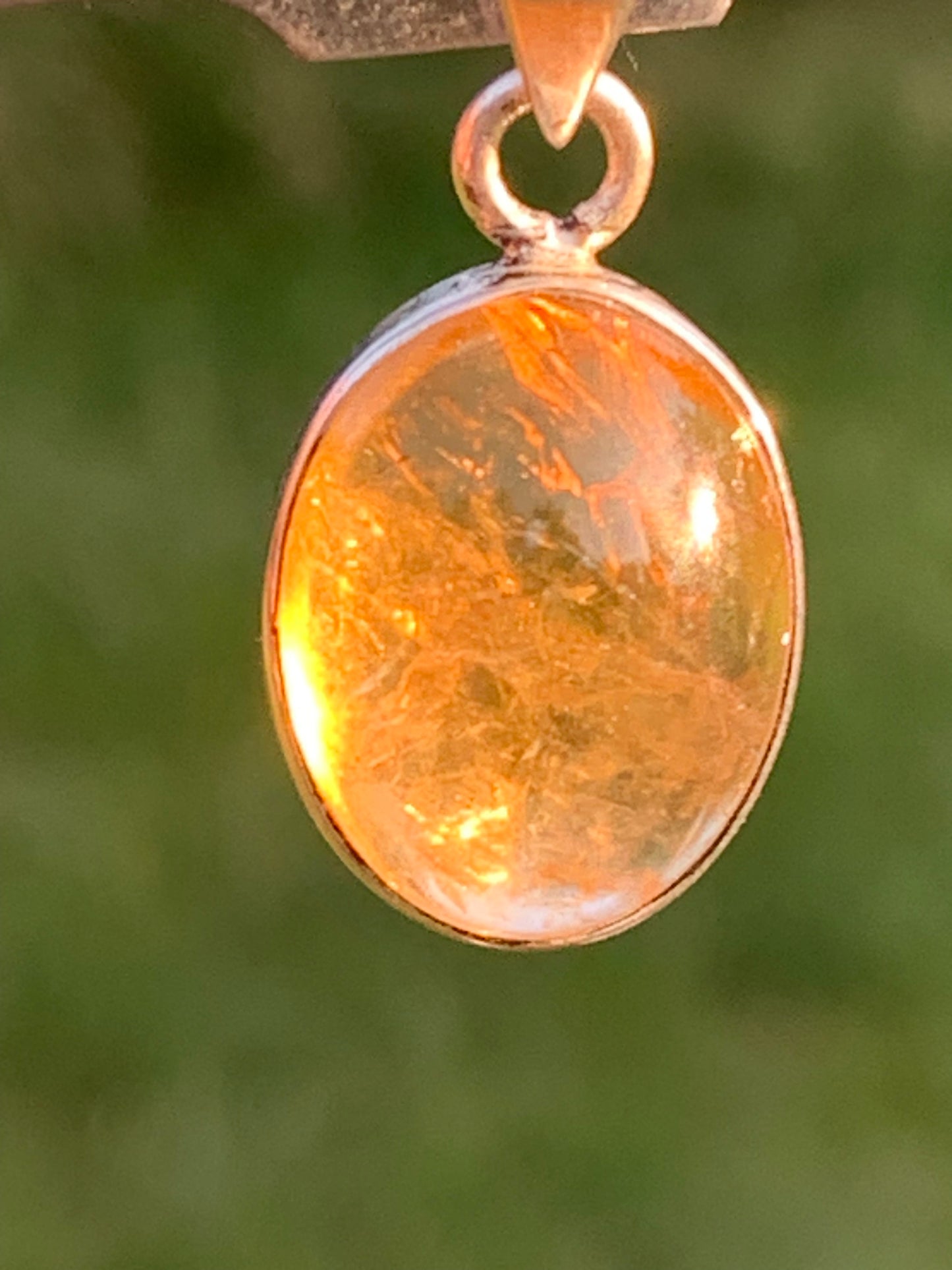 Citrine, silver medallion 30mm high x 14 x 8. Sold with adjustable cord, ready to wear!