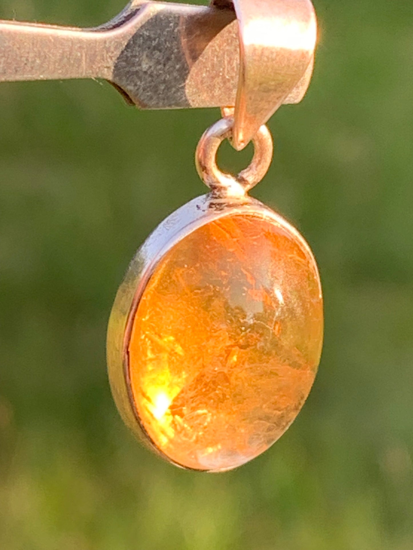 Citrine, silver medallion 30mm high x 14 x 8. Sold with adjustable cord, ready to wear!