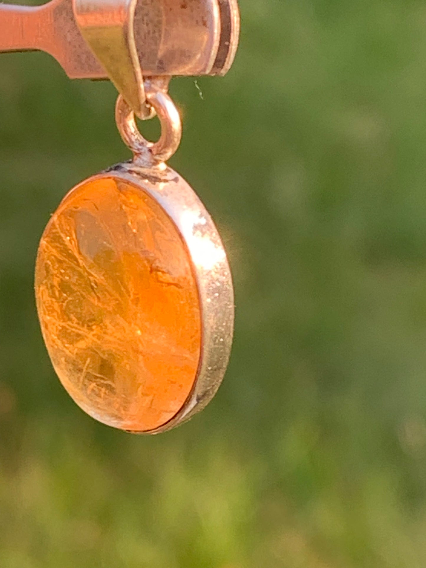 Citrine, silver medallion 30mm high x 14 x 8. Sold with adjustable cord, ready to wear!