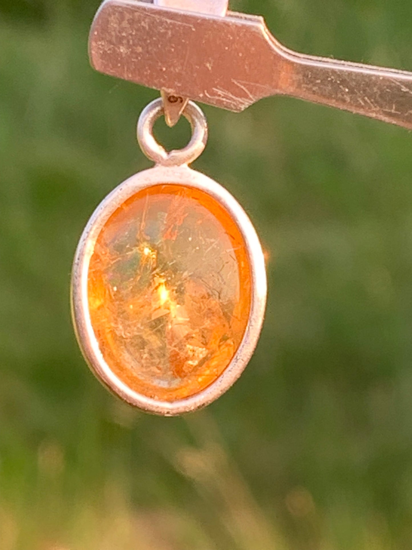 Citrine, silver medallion 30mm high x 14 x 8. Sold with adjustable cord, ready to wear!