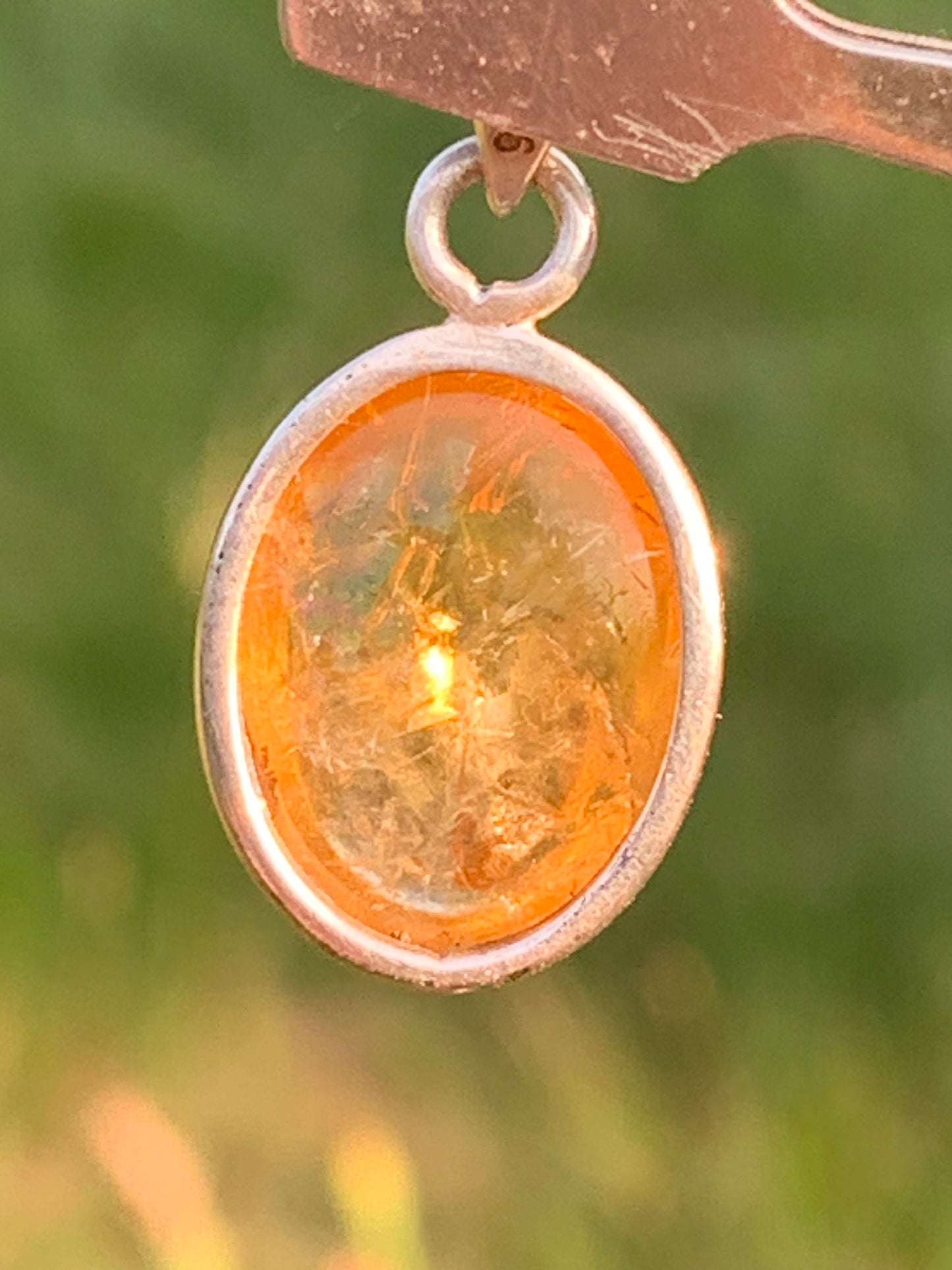 Citrine, silver medallion 30mm high x 14 x 8. Sold with adjustable cord, ready to wear!
