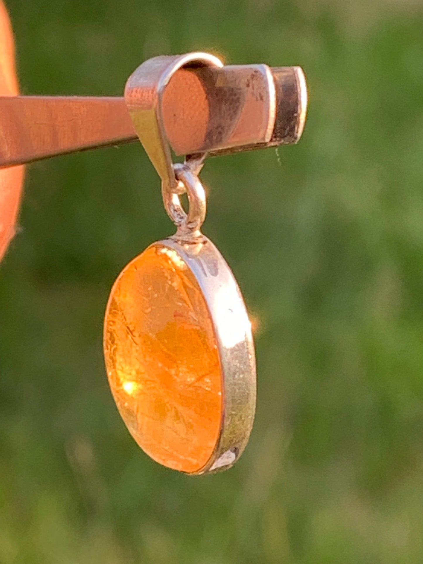 Citrine, silver medallion 30mm high x 14 x 8. Sold with adjustable cord, ready to wear!