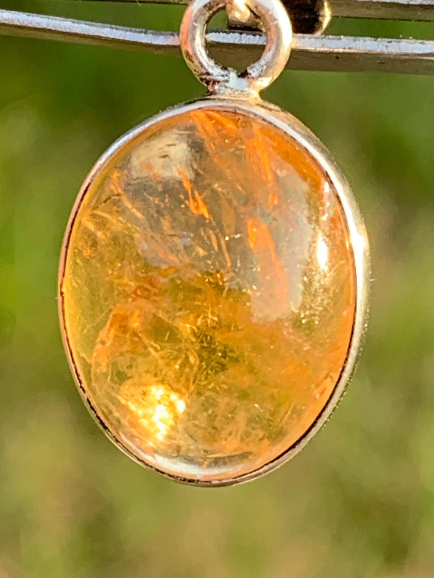 Citrine, silver medallion 30mm high x 14 x 8. Sold with adjustable cord, ready to wear!