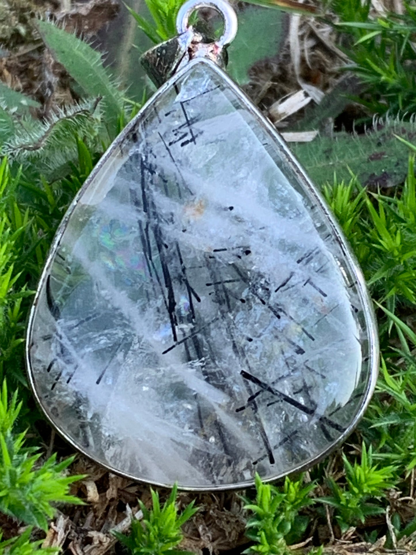 Rock crystal/quartz with black tourmaline inclusions! Silver pendant, 48mm high x30 x7. Sold with adjustable black cord!