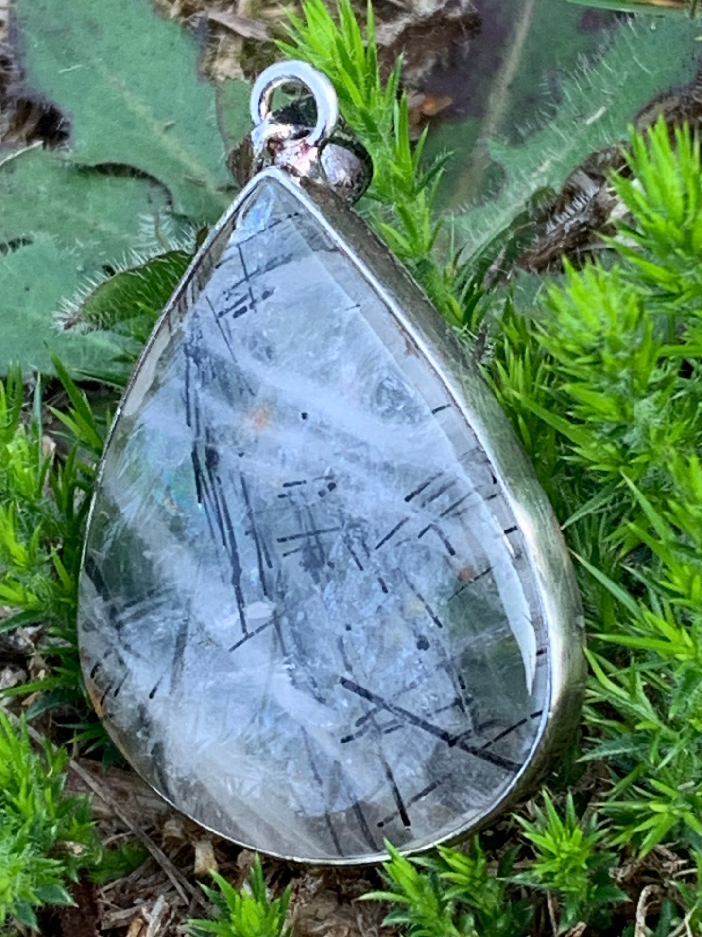 Rock crystal/quartz with black tourmaline inclusions! Silver pendant, 48mm high x30 x7. Sold with adjustable black cord!