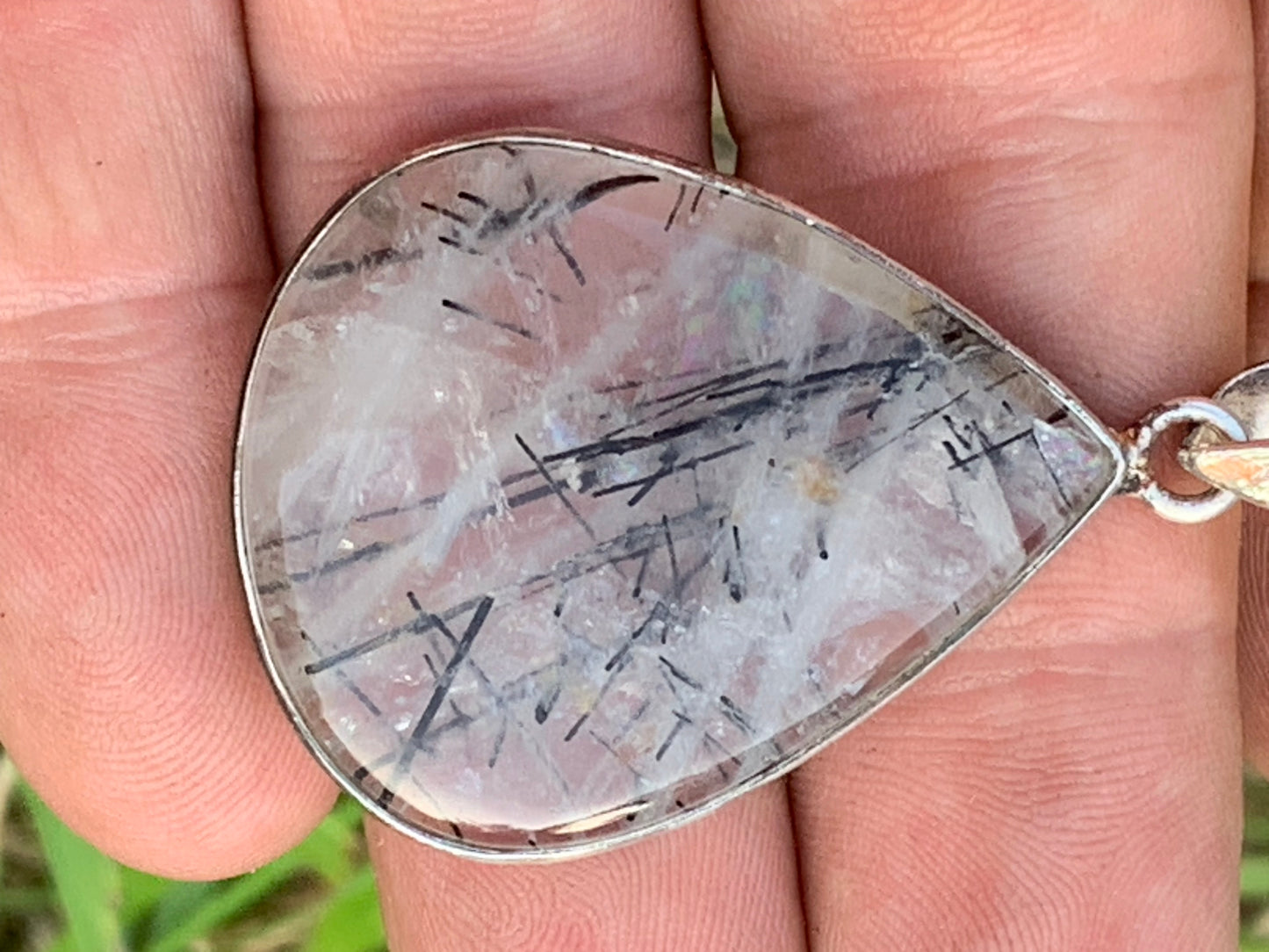 Rock crystal/quartz with black tourmaline inclusions! Silver pendant, 48mm high x30 x7. Sold with adjustable black cord!