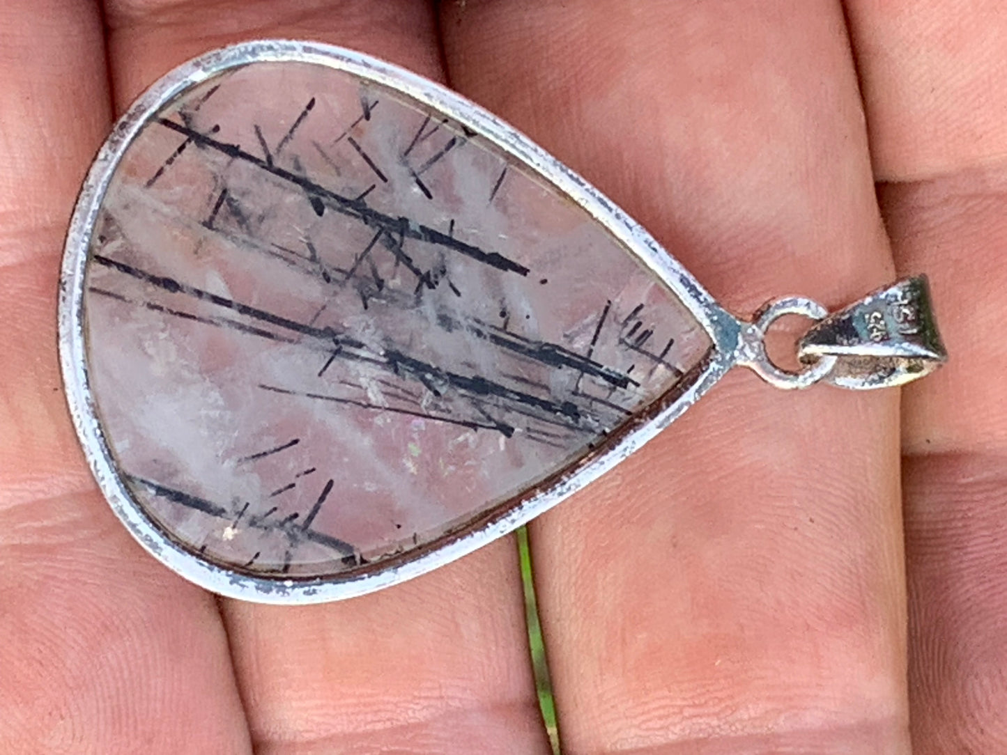Rock crystal/quartz with black tourmaline inclusions! Silver pendant, 48mm high x30 x7. Sold with adjustable black cord!