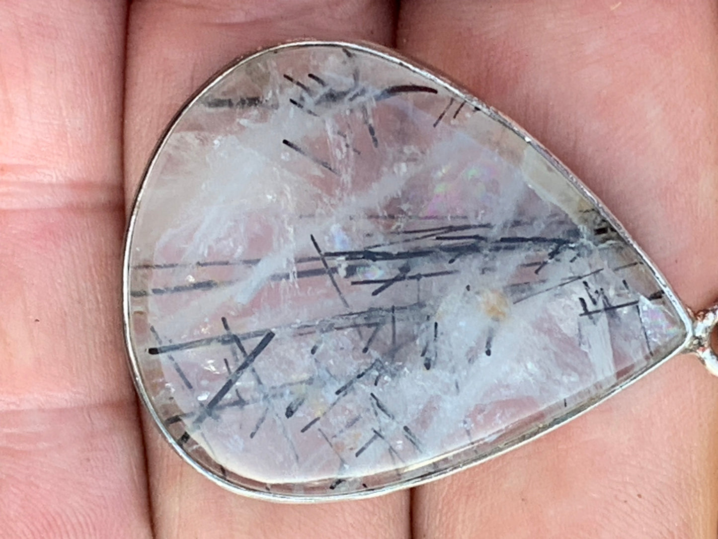 Rock crystal/quartz with black tourmaline inclusions! Silver pendant, 48mm high x30 x7. Sold with adjustable black cord!