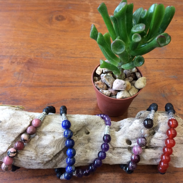 Ethnic bracelet collection... Made of 8mm lava beads and 7 semi-precious stone beads. Available in lengths from 17 to 21 centimeters. Handmade by Gem & Zen!