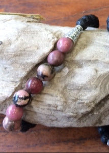 Ethnic bracelet collection... Made of 8mm lava beads and 7 semi-precious stone beads. Available in lengths from 17 to 21 centimeters. Handmade by Gem & Zen!