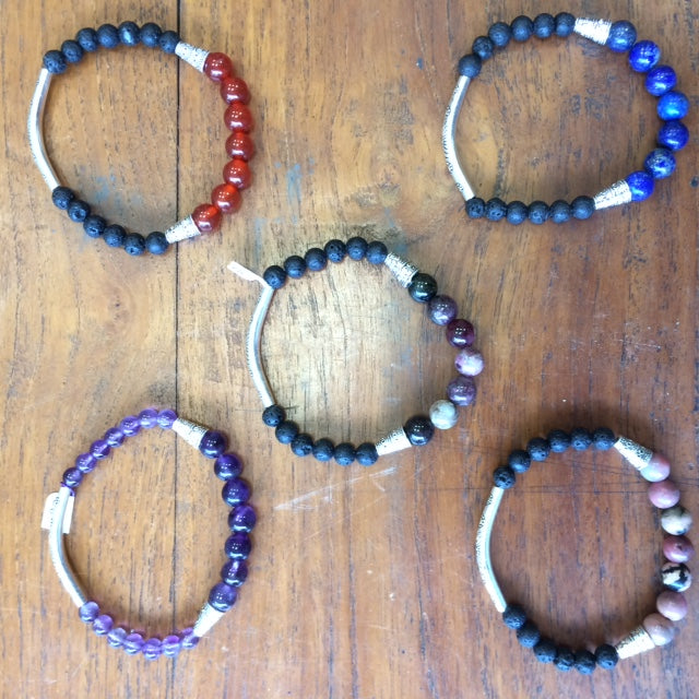 Ethnic bracelet collection... Made of 8mm lava beads and 7 semi-precious stone beads. Available in lengths from 17 to 21 centimeters. Handmade by Gem & Zen!