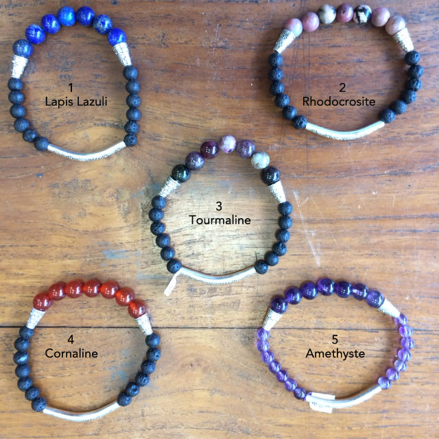 Ethnic bracelet collection... Made of 8mm lava beads and 7 semi-precious stone beads. Available in lengths from 17 to 21 centimeters. Handmade by Gem & Zen!