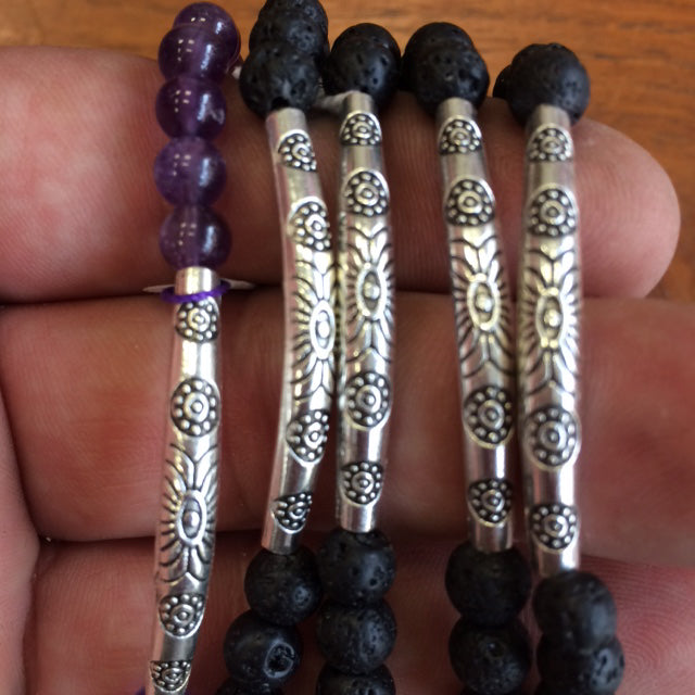 Ethnic bracelet collection... Made of 8mm lava beads and 7 semi-precious stone beads. Available in lengths from 17 to 21 centimeters. Handmade by Gem & Zen!
