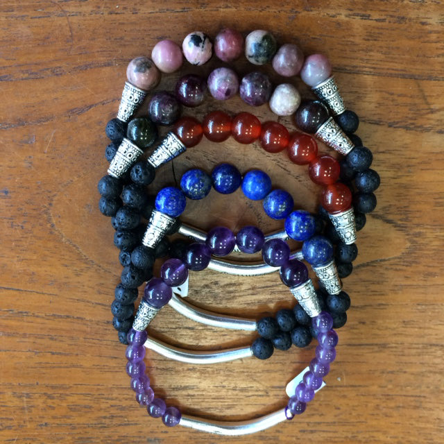 Ethnic bracelet collection... Made of 8mm lava beads and 7 semi-precious stone beads. Available in lengths from 17 to 21 centimeters. Handmade by Gem & Zen!