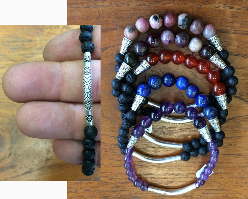 Ethnic bracelet collection... Made of 8mm lava beads and 7 semi-precious stone beads. Available in lengths from 17 to 21 centimeters. Handmade by Gem & Zen!