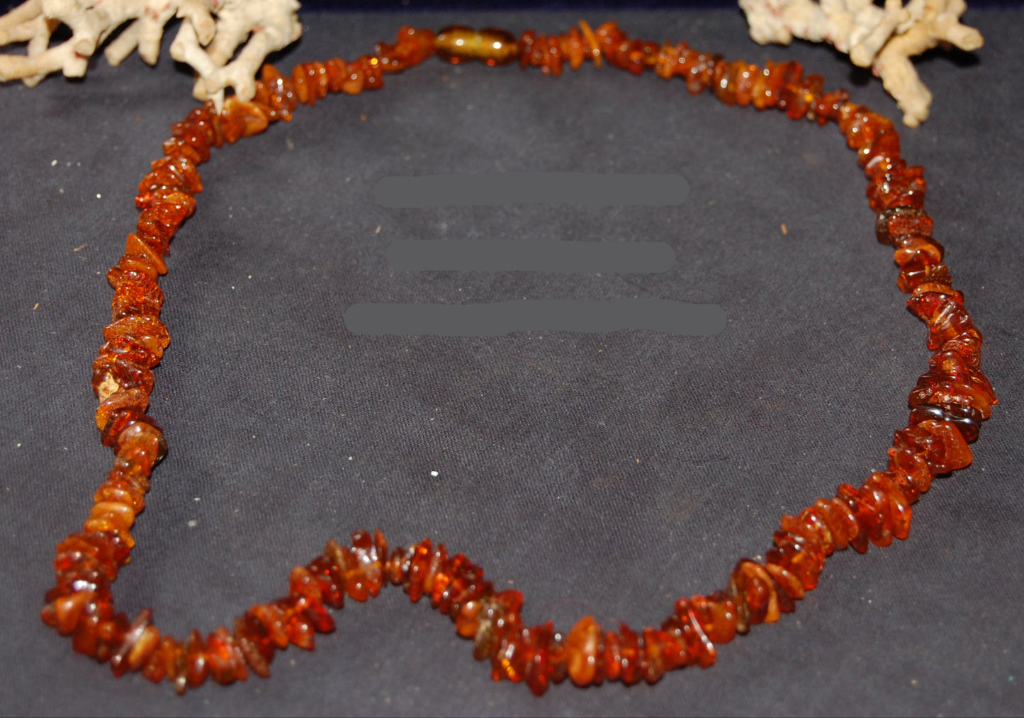 Amber, free-form beads measuring 10 to 15 millimeters, sold as a bracelet or necklace of approximately 65 centimeters. Amber screw clasp system. AA to AAA quality, superb beads, lightweight and incredibly soft!