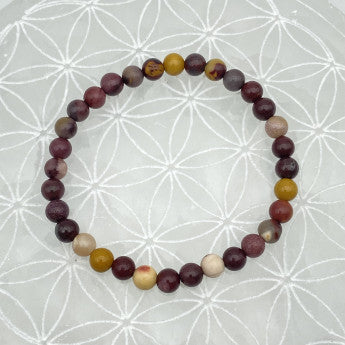 Jaspe Mookaïte, perles rondes de 6 ou 8 mm. Vendu en fil de perle 38/39 cm, en bracelet de 17 à 21cm, en collier de 45 ou sautoir de 60cm. Qualité AA à AAA !