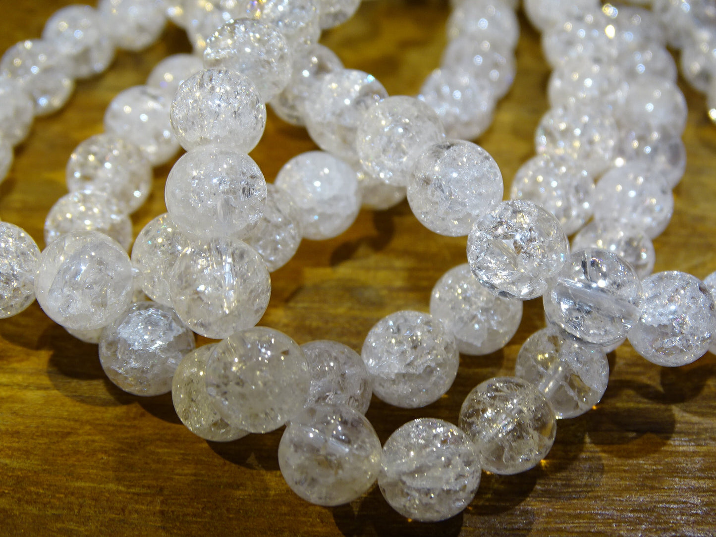 Cristal de roche 'Craquelé' ou 'Neige' (Quartz), perles rondes de 4, 6, 8, 10, 12, 14 mm. Vendu en fil de perle 38/39 cm, en bracelet de 17 à 21 cm, en collier de 45 ou sautoir de 60 cm !