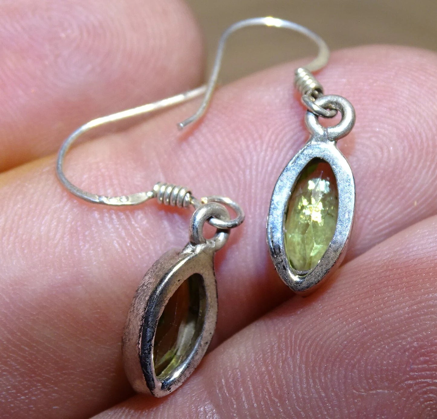Peridot earrings, grade A to AA. Sold in silver finish, a true pair of wonders, perfect!