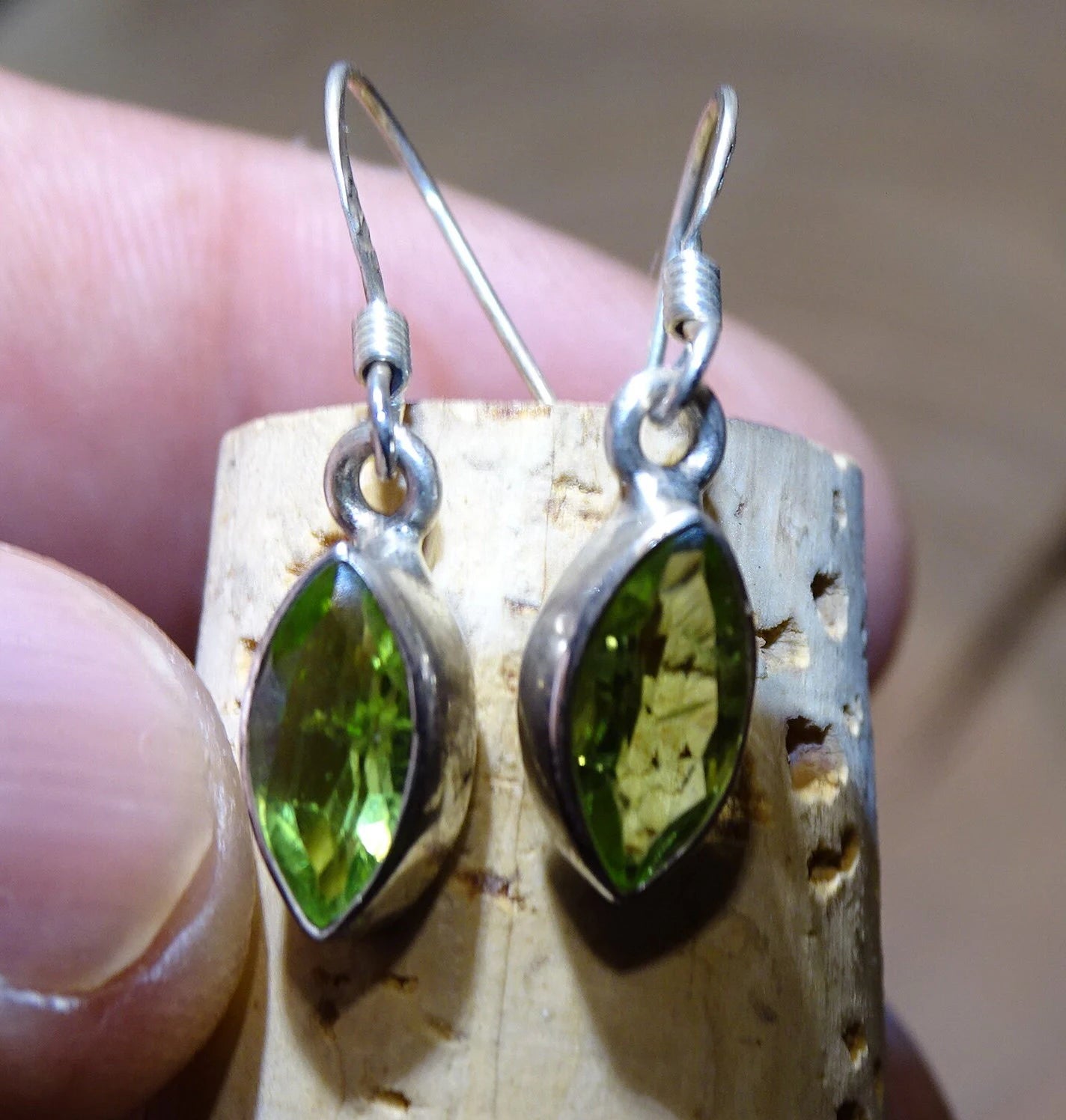 Peridot earrings, grade A to AA. Sold in silver finish, a true pair of wonders, perfect!