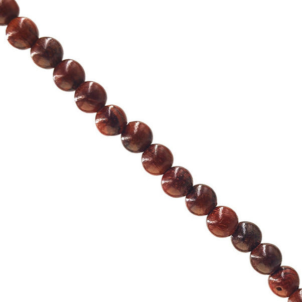 Palissandre (bois), en fil de perle de 6mm, bracelet de 17 à 21cm, collier de 42cm et sautoir de 60cm. Perles rondes, finition naturelle, magnifique !