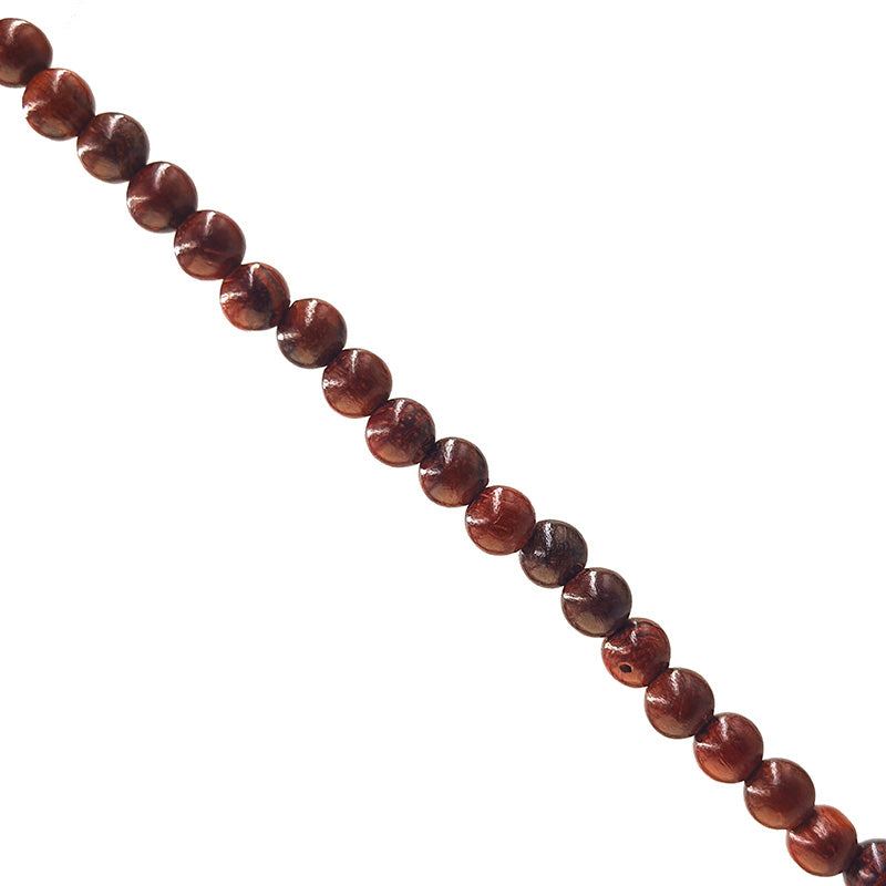 Palissandre (bois), en fil de perle de 6mm, bracelet de 17 à 21cm, collier de 42cm et sautoir de 60cm. Perles rondes, finition naturelle, magnifique !