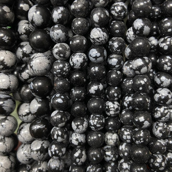 Obsidienne Flocon de Neige/ Mouchetée, perles rondes de 6 ou 8 mm. Vendu en fil de perle 38/39 cm, en bracelet de 17 à 21cm, en collier de 45 ou sautoir de 60cm. Qualité AA à AAA !
