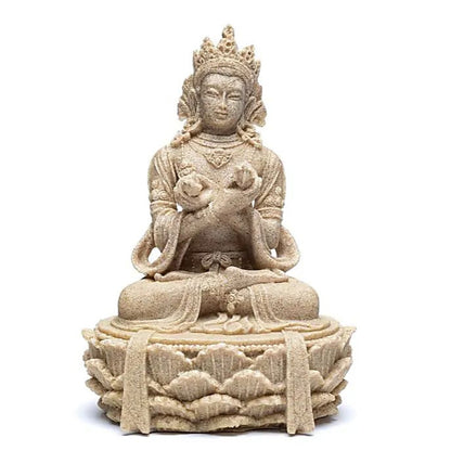 Statue de Tara en 'sable', la divinté porte une Dorje (Vajra) et une cloche. 17 centimètres de hauteur - 390 grammes !