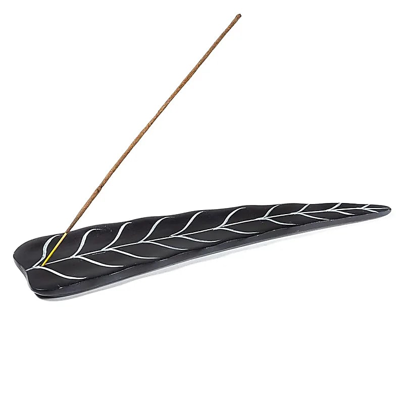 A selection of incense stick holders. These models are made of soapstone, 25/26 centimeters long.