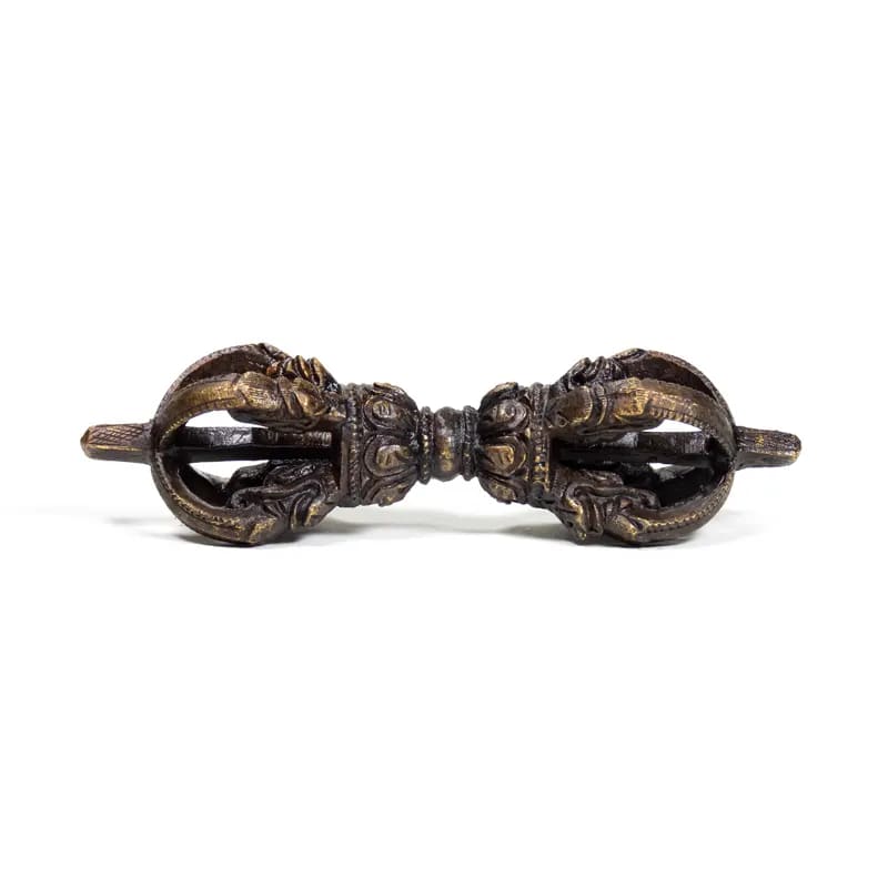 Dorje and bell made of high-quality plain bronze. The sound is exceptionally clear and lasts twice as long as a brass bell. This bell can also be turned with a stick, much like a singing bowl.