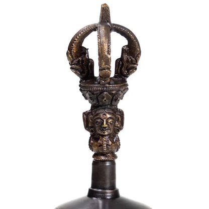 Dorje and bell made of high-quality plain bronze. The sound is exceptionally clear and lasts twice as long as a brass bell. This bell can also be turned with a stick, much like a singing bowl.
