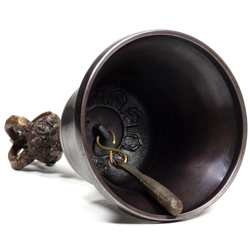 Dorje and bell made of high-quality plain bronze. The sound is exceptionally clear and lasts twice as long as a brass bell. This bell can also be turned with a stick, much like a singing bowl.
