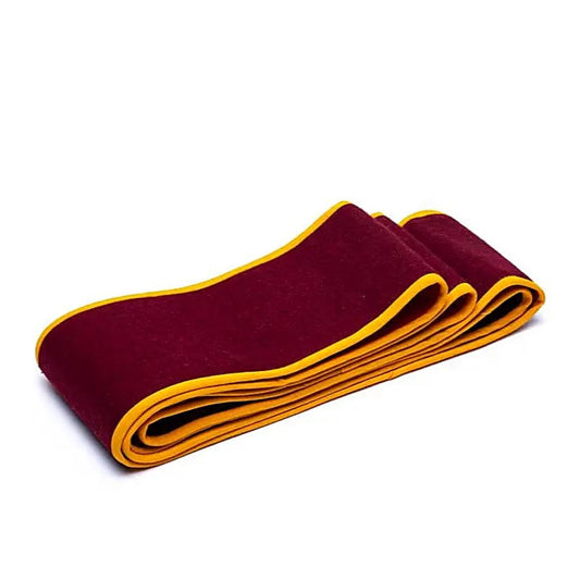 A gomthak (Wylie: bsgom thag) is a Tibetan-style meditation belt. Approximately 212x9.5 cm - 180 grams. Provides essential support to the spine and back, making it easier to maintain a comfortable sitting position!