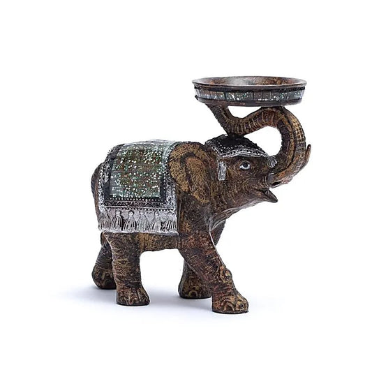 Elephant statuette/candle holder measuring 14x6x7 centimeters. Made in Nepal, perfect for a meditation room, altar, collection, exhibition...!