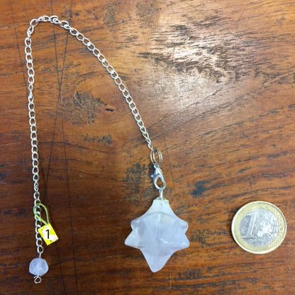 A selection of pendulums, available in plain or chain versions, with 7 chakras. Perfect for dowsing, professionals, and beginners!