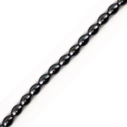 Hématite, collier de perles en forme 'd'olive' de 4 x 6 ou 6x9 millimètres. 42 centimètres de longueur. 3 finitions au choix pour le système de fermeture (Argent, plaqué or, argenté). Une pierre naturelle à l'effet métal, superbe !