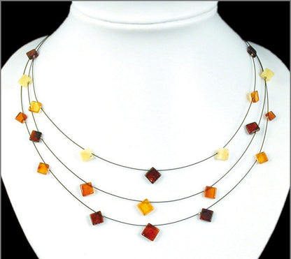 Amber, 3-row necklace of 7- to 16-millimeter square beads, sold in 45-centimeter lengths. AA to AAA quality, superb beads, lightweight and incredibly soft!