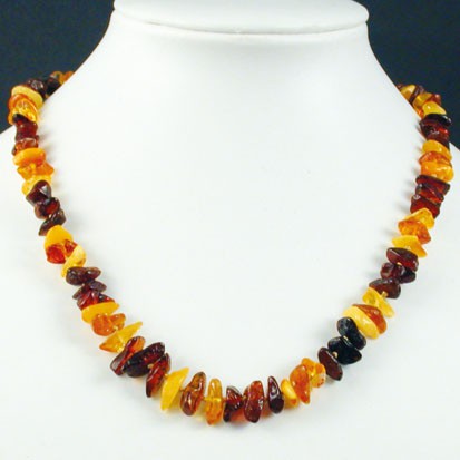 Amber, free-form beads measuring 10 to 20 millimeters, sold as a bracelet or necklace of approximately 70 centimeters. Amber screw clasp system. AA to AAA quality, superb beads, lightweight and incredibly soft!