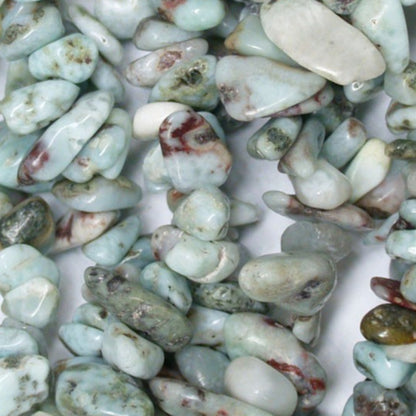 Larimar, bracelet de 17 à 21cm, collier de 42cm et sautoir de 60cm. Perles de type 'baroque/ chips' de formes naturelles montées sur fil élastique ou fil d'acier de haute résistance !