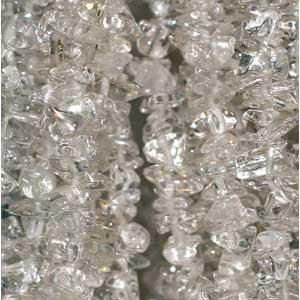 Cristal de roche/ quartz, bracelet de 17 à 21 cm ou en collier de 42 cm ou sautoir de 85 cm. Perle de type 'baroque/ chips' de 4/7 millimètres, montées sur fil élastique ou fil d'acier de haute résistance !