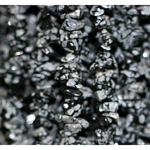 Obsidienne neige, bracelet de 17 à 21 cm ou en collier de 42 cm ou sautoir de 85 cm. Perle de type 'baroque/ chips' de 4/7 millimètres, montées sur fil élastique ou fil d'acier de haute résistance !