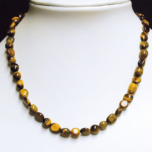 Oeil de tigre, bracelet de 17 à 21cm, collier de 42cm et sautoir de 60cm. Perles de type 'Graine' de formes naturelles montées sur fil de haute résistance !