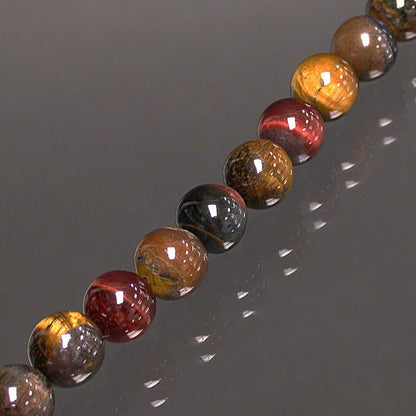 Mix 'd'oeil de tigre, oeil de taureau et oeil de faucon'. Perles rondes de 4, 6, 8 ou 10 mm. Vendu en fil de perle 38/39 cm, en bracelet de 17 à 21cm, en collier de 45 ou sautoir de 60cm. Qualité AA à AAA, parfait !