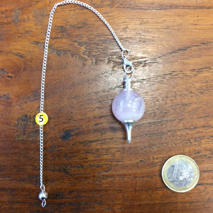 A selection of pendulums, available in plain or chain versions, with 7 chakras. Perfect for dowsing, professionals, and beginners!