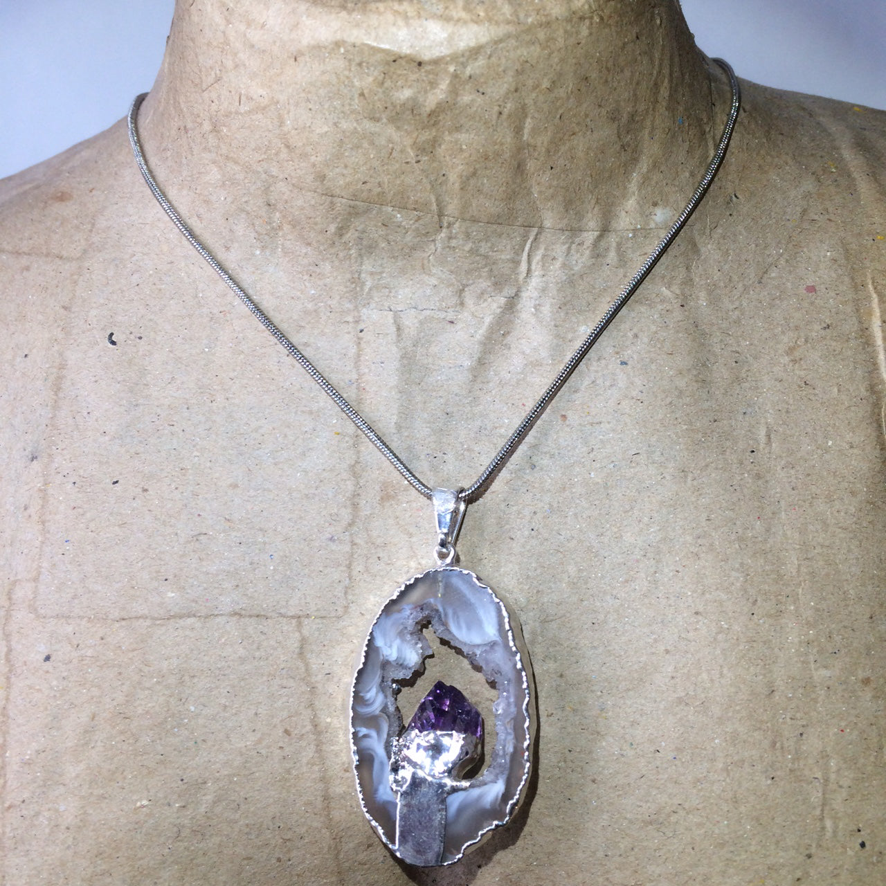 Amethyst, 'mini-geode' pendant called 'géodinhos', 45mm high x 24 wide x 7 thick. Sold with adjustable black cord!