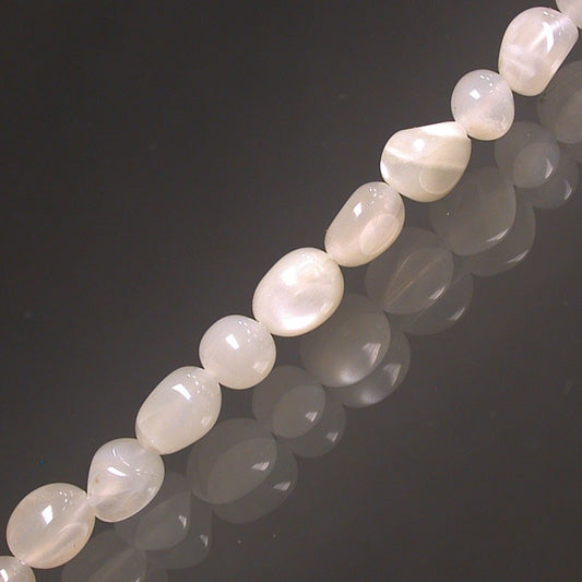 Pierre de lune, bracelet de 17 à 21cm, collier de 42cm et sautoir de 60cm. Perles de type 'Graine' de formes naturelles montées sur fil de haute résistance !