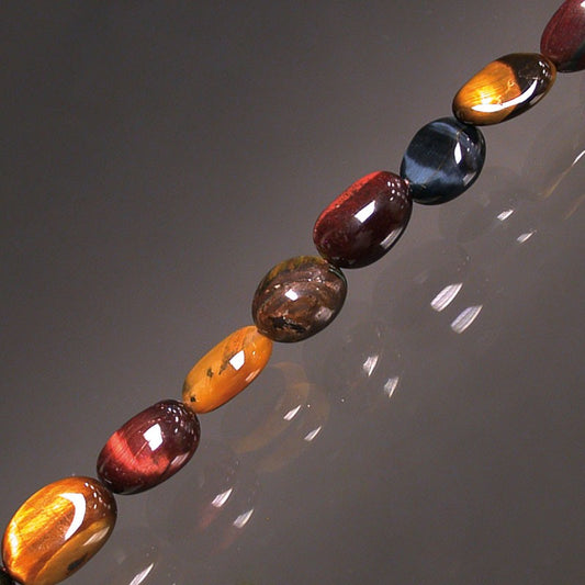 Mix 'oeil de tigre, taureau, faucon', bracelet de 17 à 21cm, collier de 42cm et sautoir de 60cm. Perles de type 'Graine' de formes naturelles montées sur fil de haute résistance !