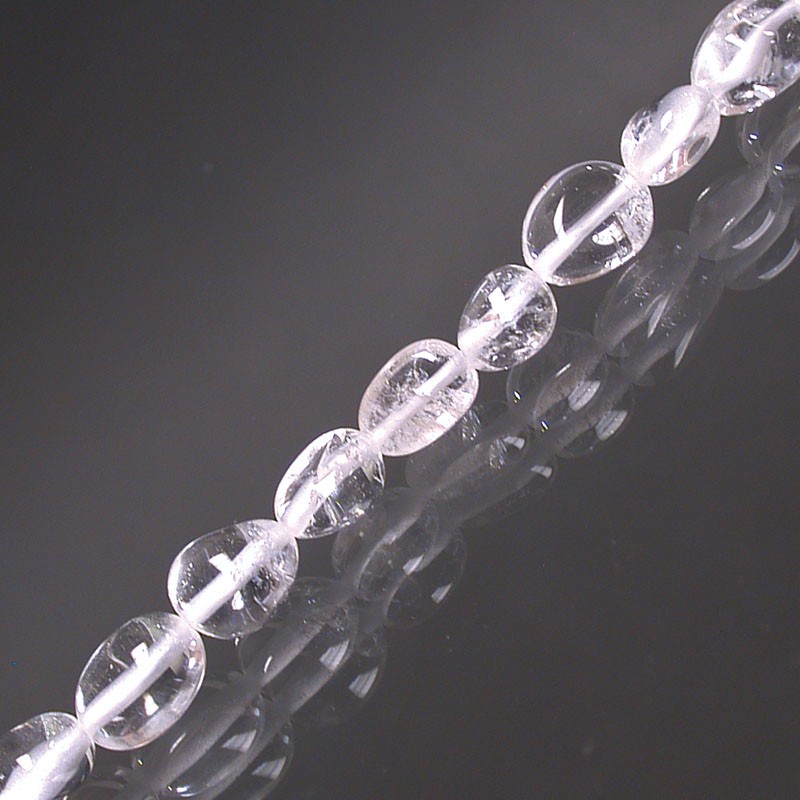 Cristal de roche, bracelet de 17 à 21cm, collier de 42cm et sautoir de 60cm. Perles de type 'Graine' de formes naturelles montées sur fil de haute résistance !