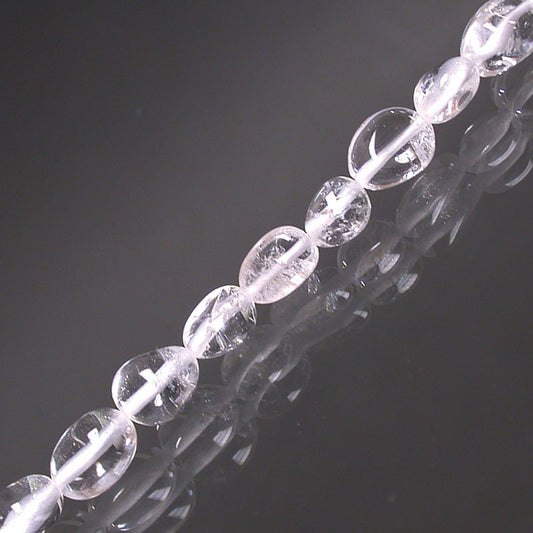 Cristal de roche, bracelet de 17 à 21cm, collier de 42cm et sautoir de 60cm. Perles de type 'Graine' de formes naturelles montées sur fil de haute résistance !